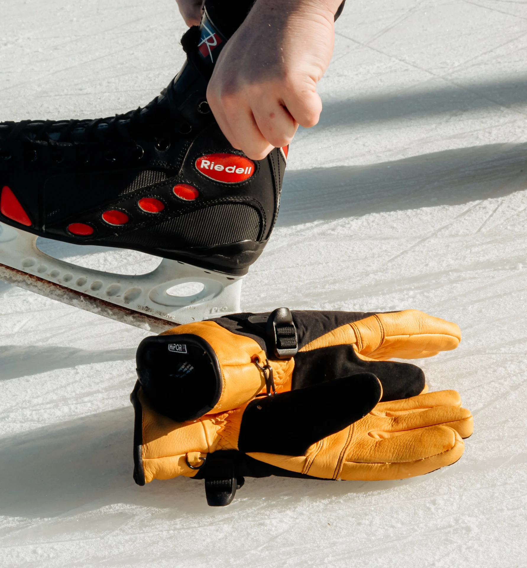 Snowpack Leather Ski Glove 3 Snowpack gloves on the ground