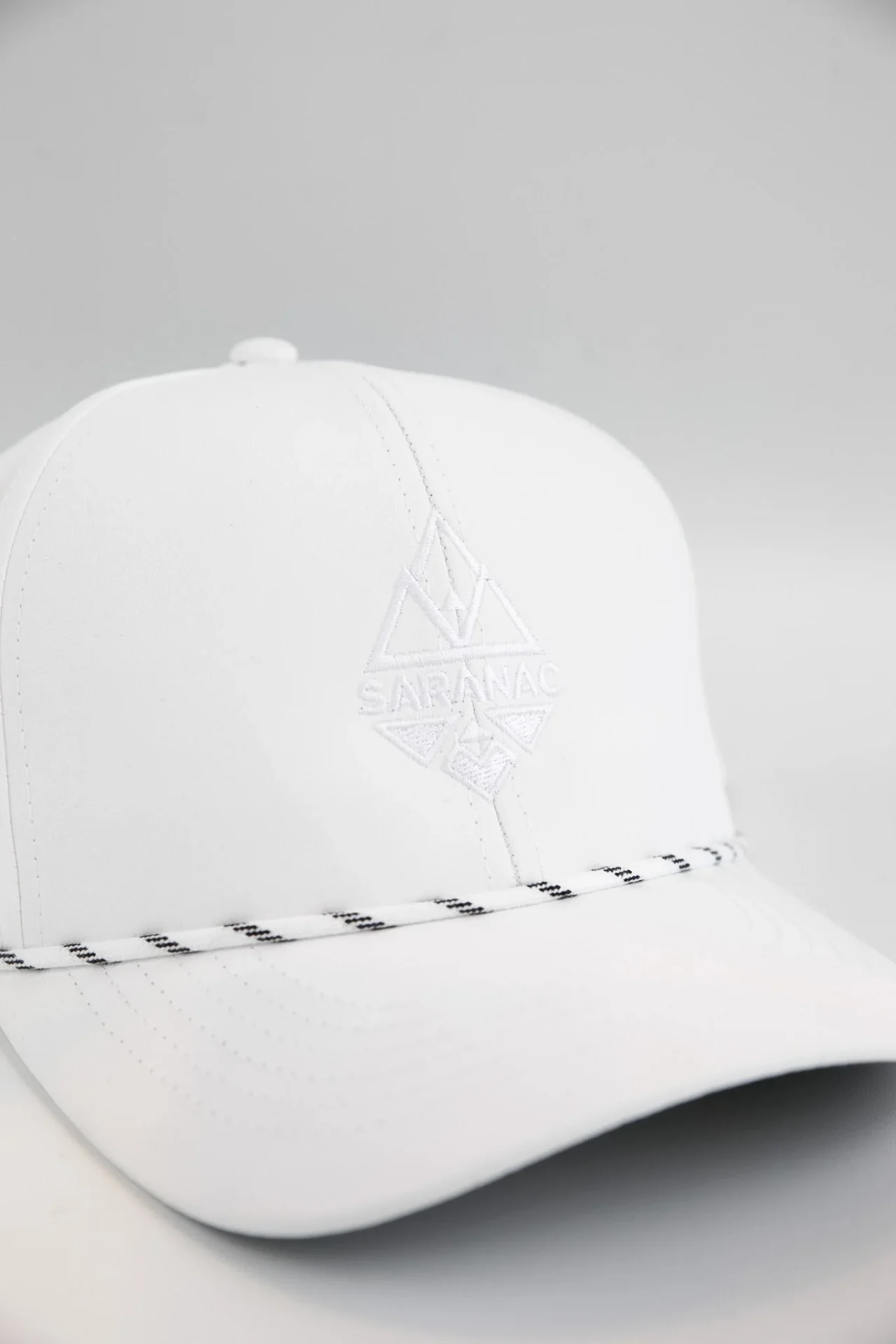 Saranac Performance Golf Hat 6 white Saranac Hat sideways